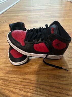 Jordan Black and Red Mid-Top Sneakers big kid